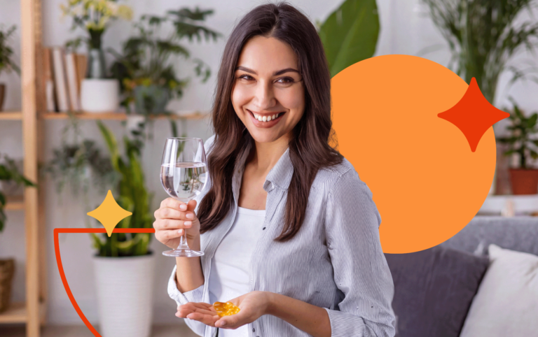 Pessoa em momento de dúvida segurando uma taça de bebida em uma mão e uma cartela de comprimidos na outra, ilustrando os riscos da mistura entre álcool e antibióticos.